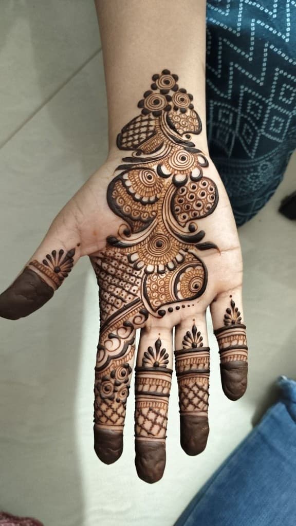 Intricate single-hand designer mehndi