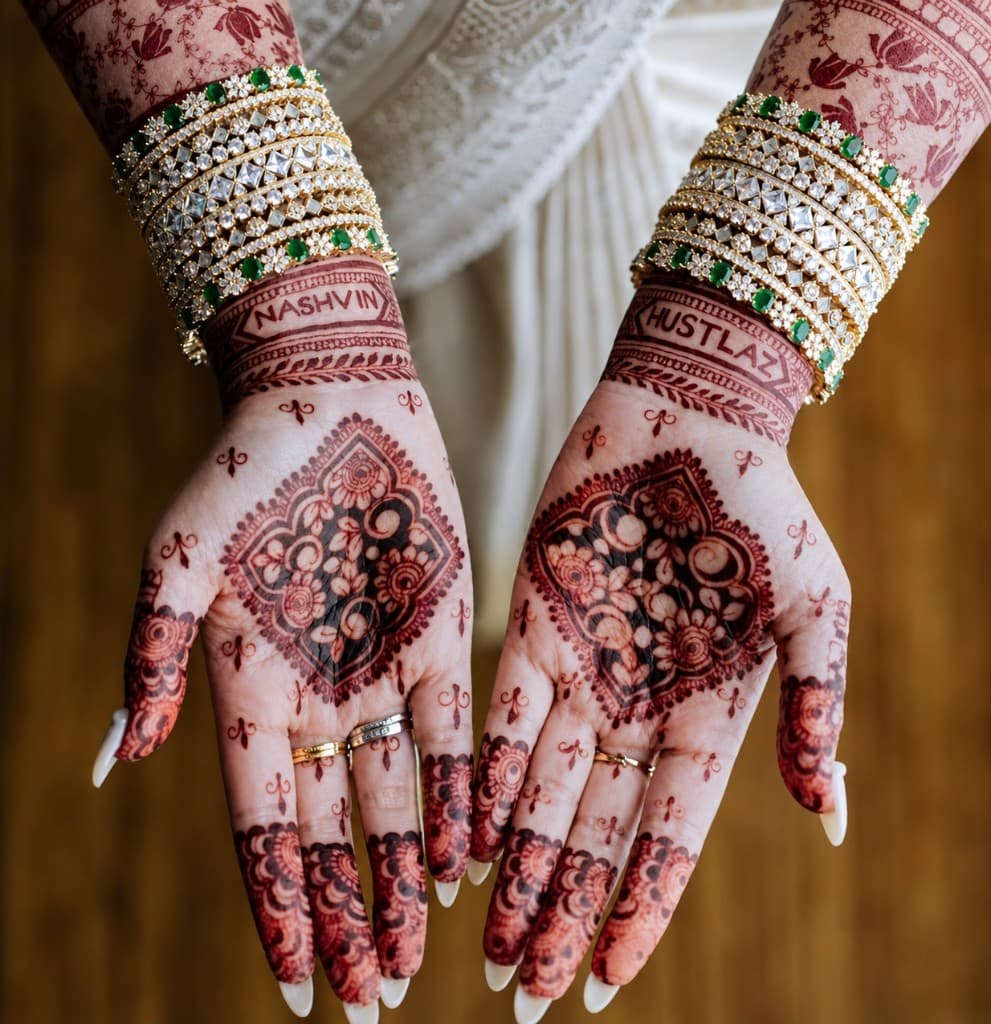 Bridal palms with name motifs and bangles